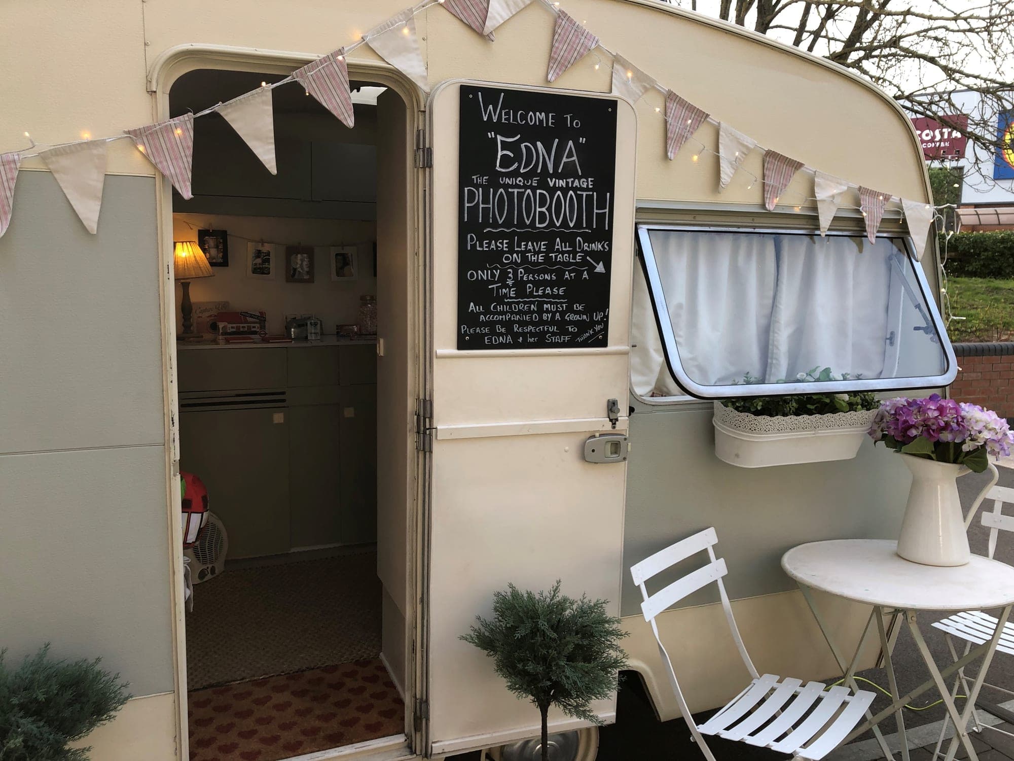 Edna the vintage caravan, set up with bunting